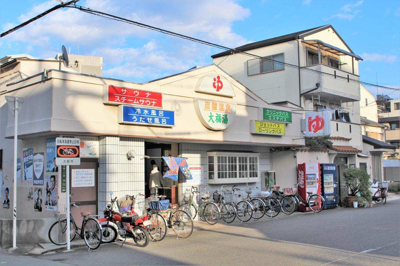 Sekai Hotel Tsuki Ōsaka Extérieur photo